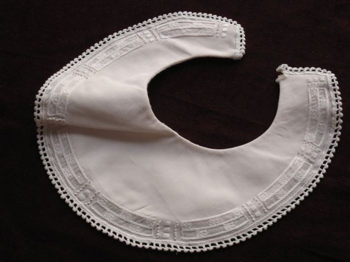Pale pink cotton hand stitched infant bib