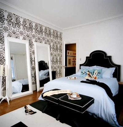 A black and white bedroom designed by pol theis