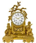 A Louis XVI style gilt bronze mantel clock