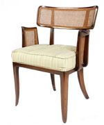 A Dunbar caned and mahogany armchair 