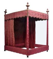 A Continental Baroque style damask upholstered bed  