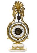 A LOUIS XVI ORMOLU, WHITE MARBLE AND BRILLIANT-INSET MANTEL CLOCK
CIRCA 1785
