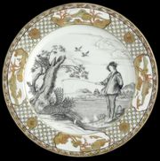 A CHINESE EXPORT 'LE PÊCHEUR' PLATE
CIRCA 1740
