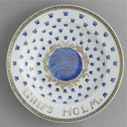 A CHINESE EXPORT ARMORIAL SOUP PLATE
CIRCA 1775
