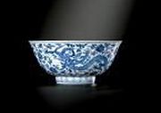 A RARE BLUE AND WHITE 'DRAGON' BOWL
TRANSCRIBED MARK AND PERIOD OF ZHEN