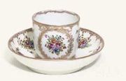 A NYMPHENBURG DOCUMENTARY COFFEE-CUP AND SAUCER AND A NYMPHENBURG MINIATURE MUG