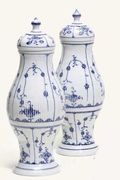 A PAIR OF RAUENSTEIN REEDED BALUSTER BLUE AND WHITE VASES AND COVERS 
