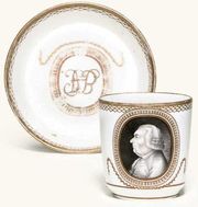 A FULDA PORTRAIT COFFEE-CUP AND SAUCER 
